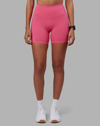Woman wearing Elixir High-Rise 6" Short - Hot Pink | Model:Rhiley | Size:S | Thumbnail Index: 7