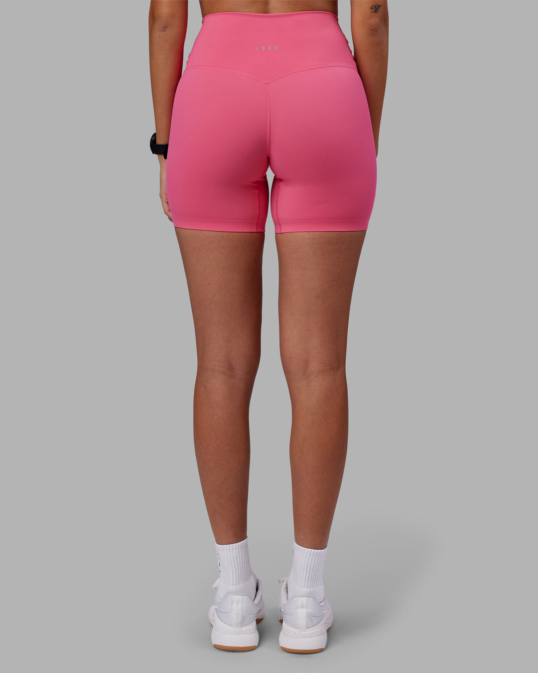 Woman wearing Elixir High-Rise 6" Short - Hot Pink | Model:Rhiley | Size:S - view 4