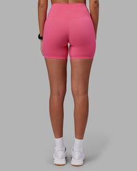 Woman wearing Elixir High-Rise 6" Short - Hot Pink | Model:Rhiley | Size:S | Thumbnail Index: 3