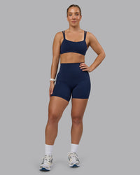 Woman wearing Elixir Ultra High-Rise 6" Short - Future Navy  | Model:Lyss | Size:S | Thumbnail Index: 1