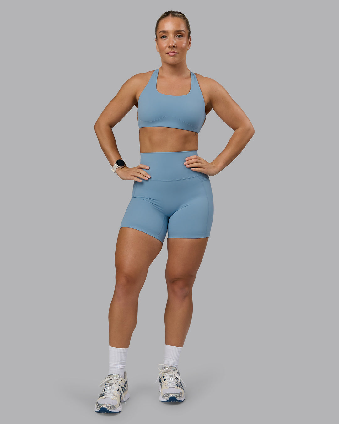 Woman wearing Elixir Ultra High-Rise 6" Short Pockets - Glacier Lake - view 3