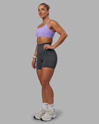 Woman wearing Elixir Ultra High-Rise 6" Short Pockets - Dark Storm | Size:S | Thumbnail Index: 4