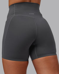 Woman wearing Elixir Ultra High-Rise 6" Short Pockets - Dark Storm | Size:S | Thumbnail Index: 7