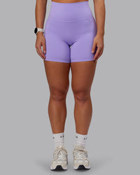 Woman wearing Elixir Ultra High-Rise 6" Short Pockets - Violet Ray | Size:S | Thumbnail Index: 1