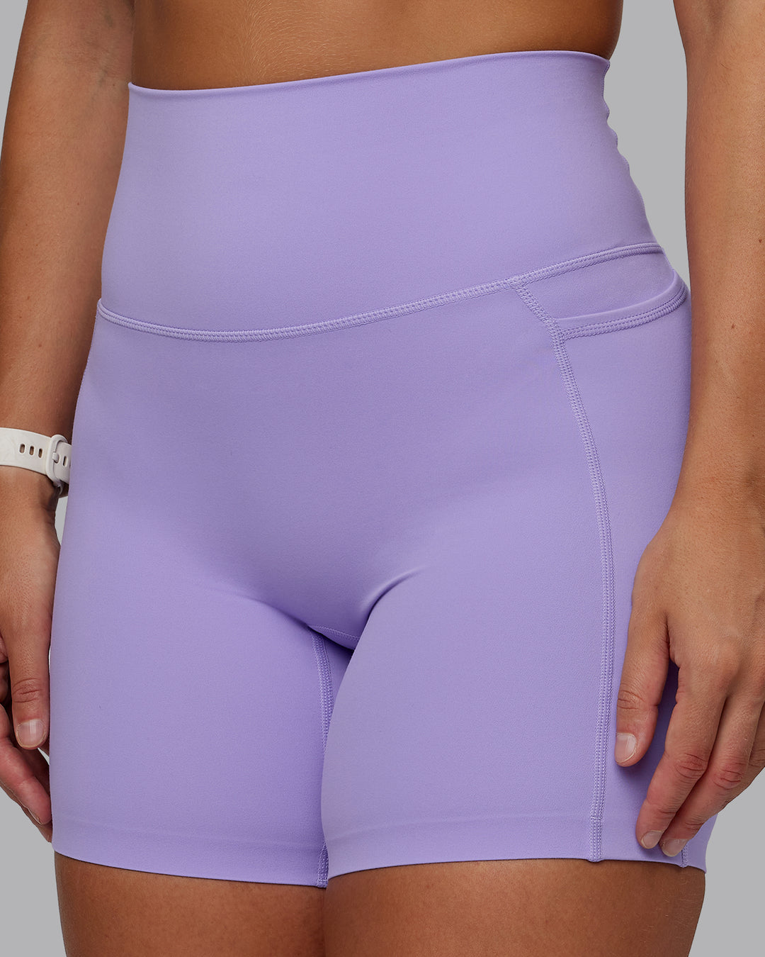 Woman wearing Elixir Ultra High-Rise 6" Short Pockets - Violet Ray | Size:S - view 7