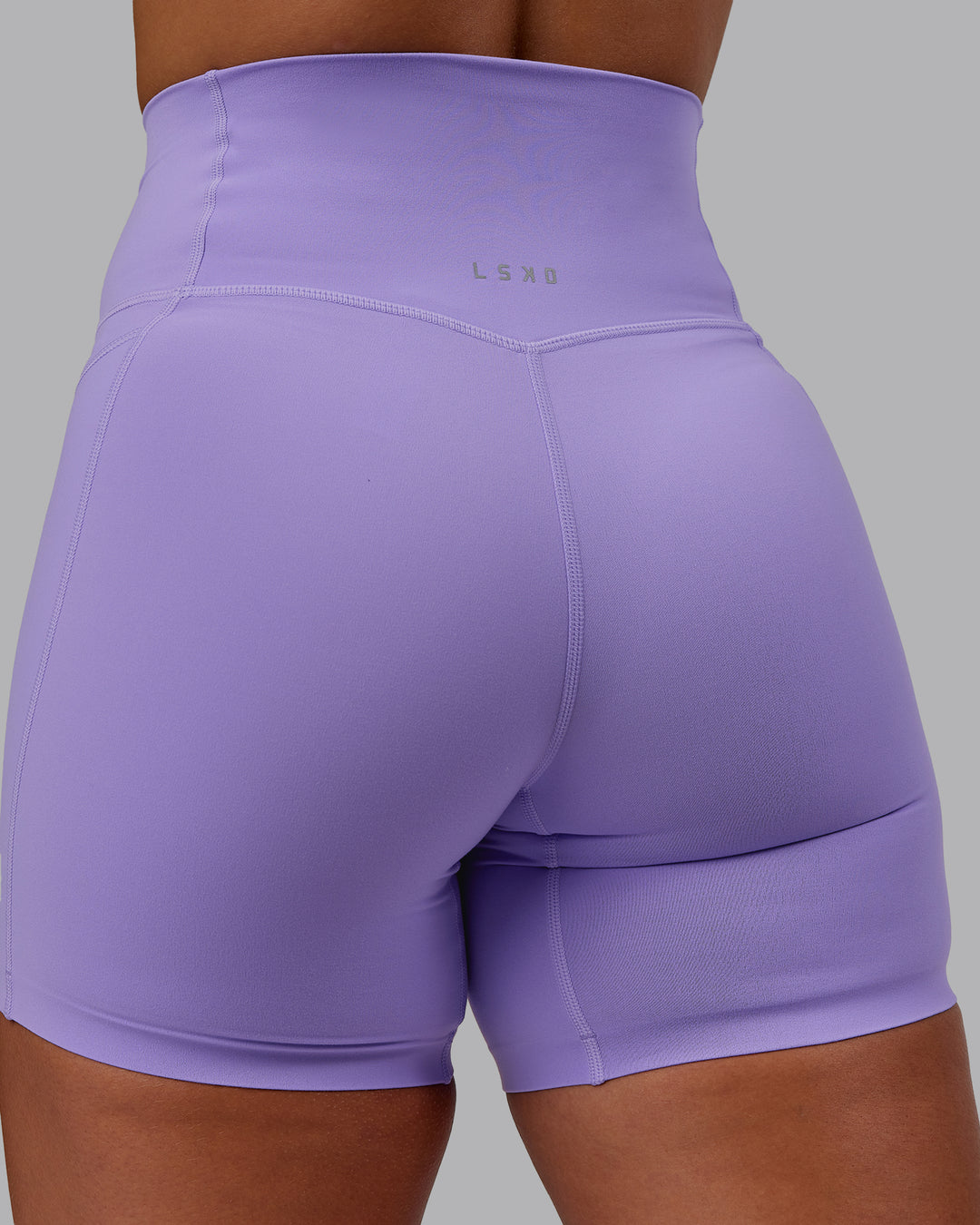 Woman wearing Elixir Ultra High-Rise 6" Short Pockets - Violet Ray | Size:S - view 10