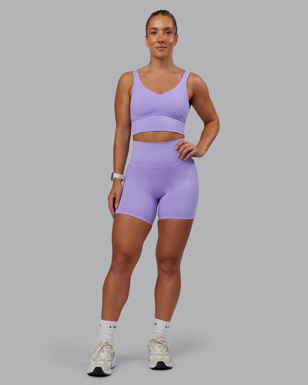Woman wearing Elixir Ultra High-Rise 6" Short Pockets - Violet Ray | Size:S - view 9