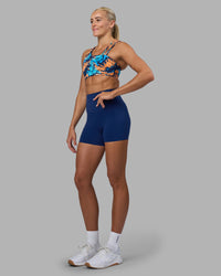 Woman wearing Elixir Ultra High-Rise 4" Short - Midnight Blue | Model:Katie | Size:S | Thumbnail Index: 1