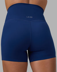 Woman wearing Elixir Ultra High-Rise 4" Short - Midnight Blue | Model:Katie | Size:S | Thumbnail Index: 6