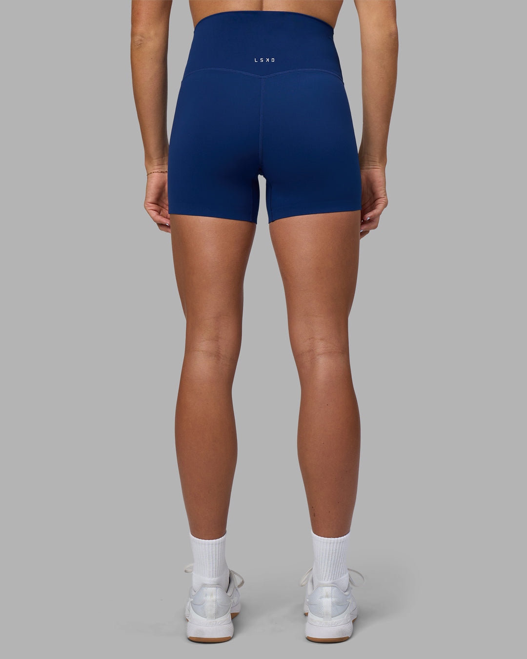 Woman wearing Elixir Ultra High-Rise 4" Short - Midnight Blue | Model:Katie | Size:S - view 4
