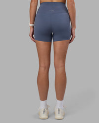 Woman wearing Elixir Ultra High-Rise 4" Short - Night Shadow | Model:Phoebe | Size:S | Thumbnail Index: 3