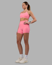 Woman wearing Elixir Ultra High-Rise 4" Short Pockets - Candy Pink | Model:Phoebe | Size:S | Thumbnail Index: 5