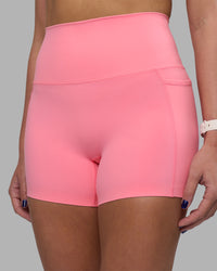 Woman wearing Elixir Ultra High-Rise 4" Short Pockets - Candy Pink | Model:Phoebe | Size:S | Thumbnail Index: 2