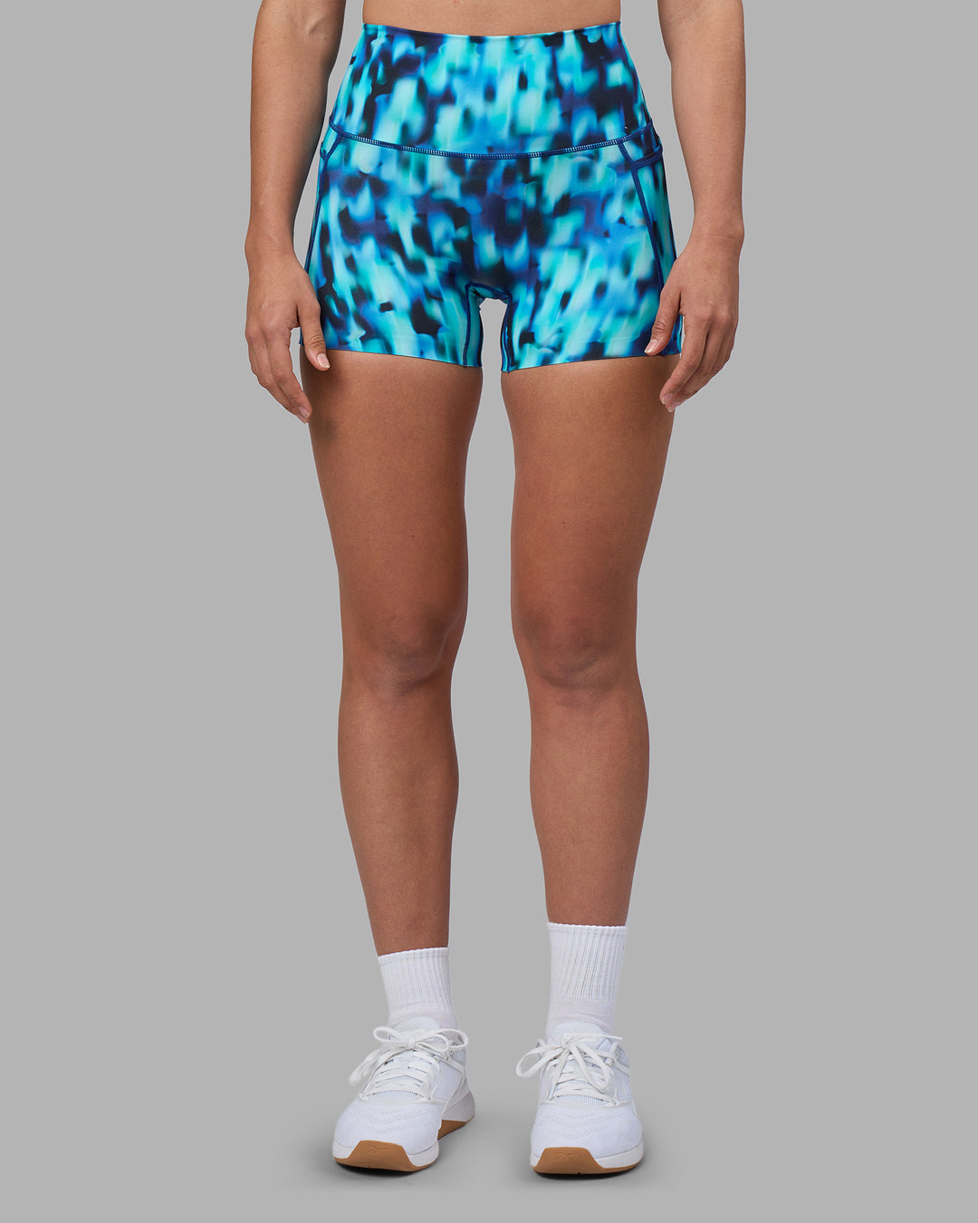 Woman wearing Elixir Ultra High-Rise 4" Short Pockets - Luminous | Model:Sophie | Size:S - view 1