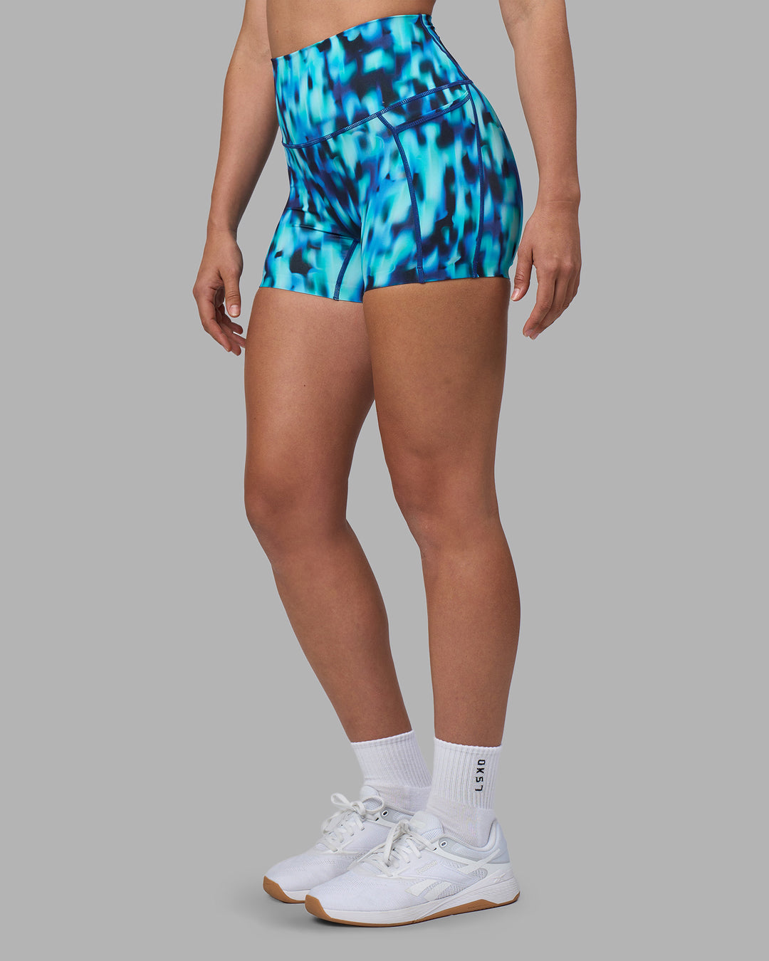 Woman wearing Elixir Ultra High-Rise 4" Short Pockets - Luminous | Model:Sophie | Size:S - view 10