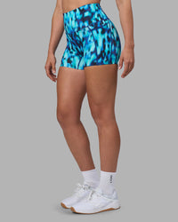 Woman wearing Elixir Ultra High-Rise 4" Short Pockets - Luminous | Model:Sophie | Size:S | Thumbnail Index: 9