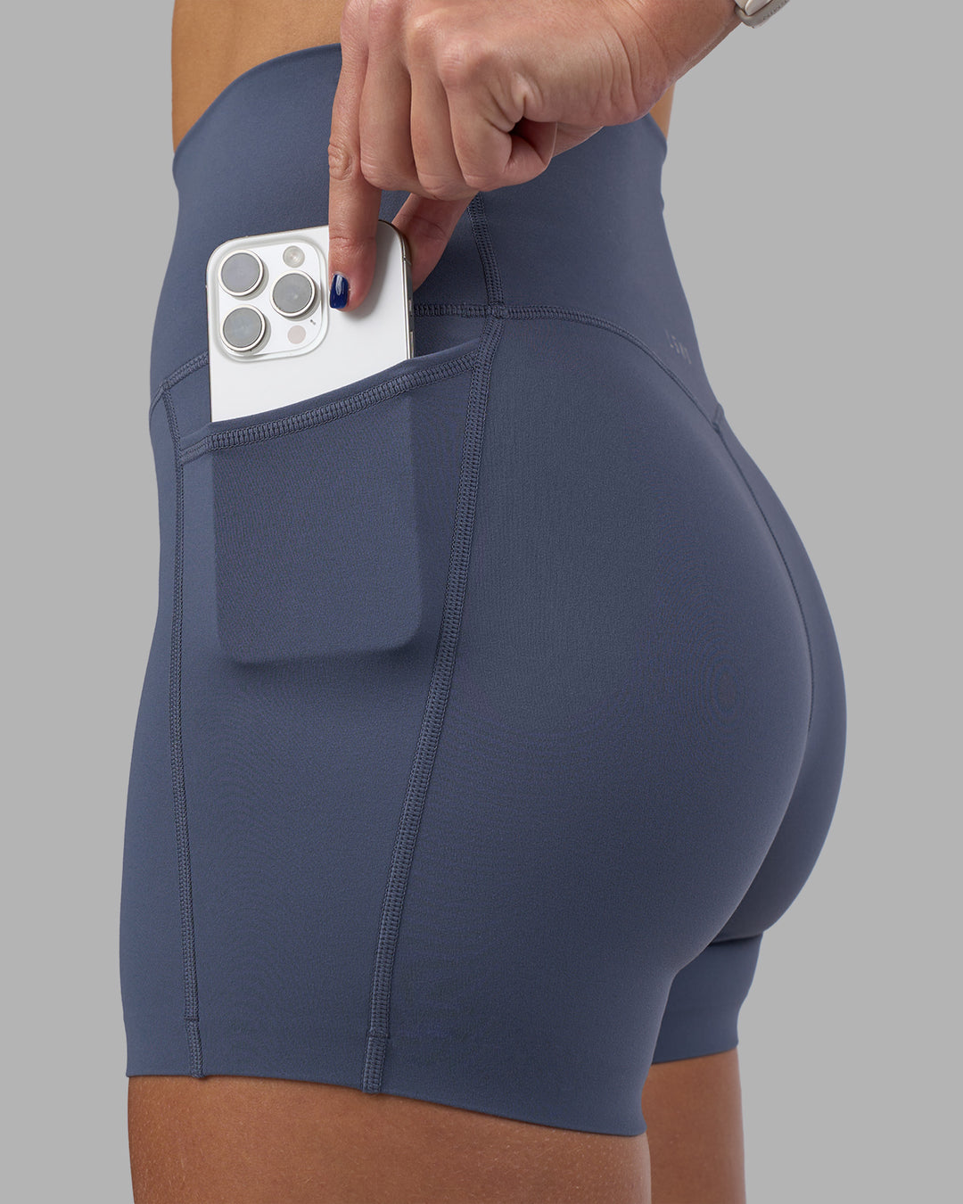 Woman wearing Elixir Ultra High-Rise 4" Short Pockets - Night Shadow | Model:Phoebe | Size:S - view 6