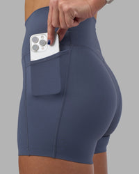 Woman wearing Elixir Ultra High-Rise 4" Short Pockets - Night Shadow | Model:Phoebe | Size:S | Thumbnail Index: 5