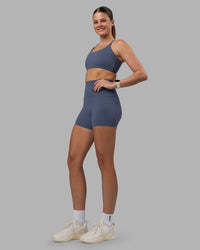 Woman wearing Elixir Ultra High-Rise 4" Short Pockets - Night Shadow | Model:Phoebe | Size:S | Thumbnail Index: 7