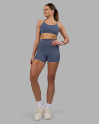 Woman wearing Elixir Ultra High-Rise 4" Short Pockets - Night Shadow | Model:Phoebe | Size:S | Thumbnail Index: 4