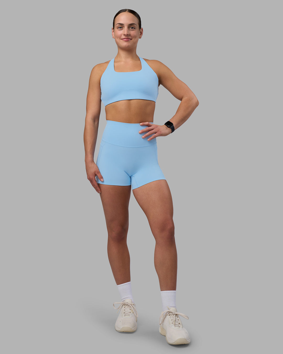 Woman wearing Elixir Ultra High-Rise 4" Short Pockets - Open Air | Model:Keisha | Size:S - view 2