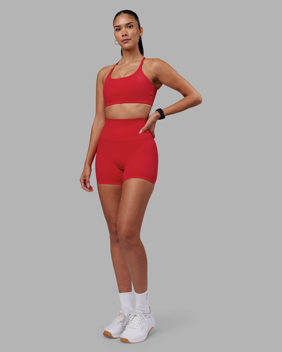 Woman wearing Elixir Ultra High-Rise 4" Short - Scarlet | Model:Rhiley | Size:S