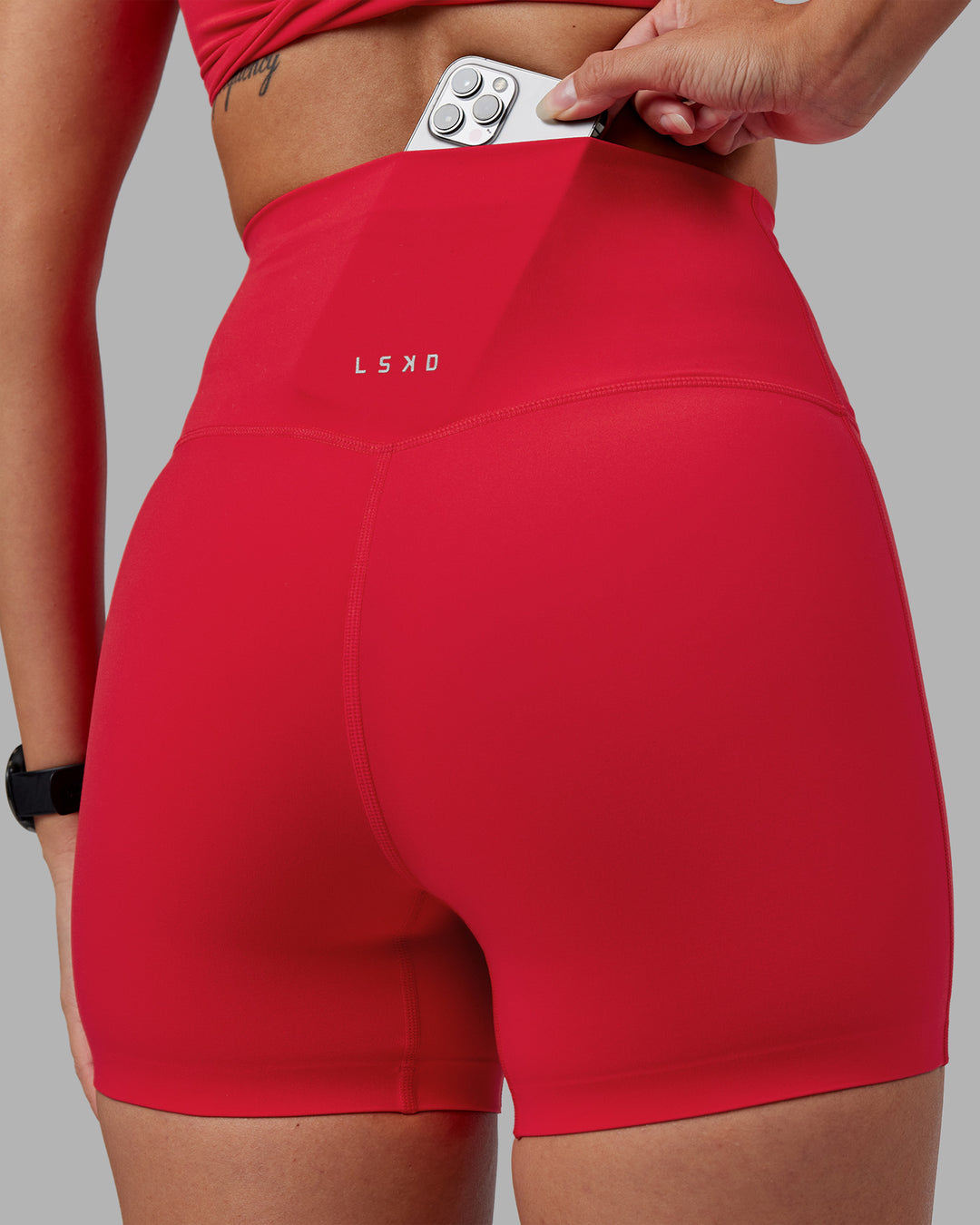 Woman wearing Elixir Ultra High-Rise 4" Short - Scarlet | Model:Rhiley | Size:S - view 4