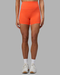 Woman wearing Elixir Ultra High-Rise 4" Short - Ultra Orange | Model:Katie | Size:S | Thumbnail Index: 5