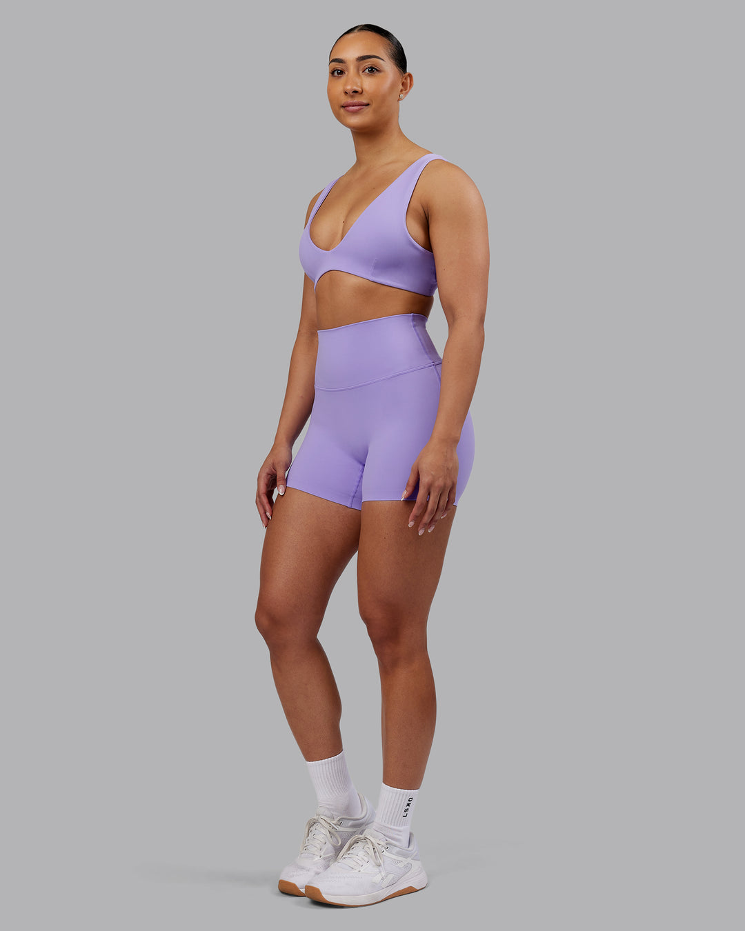 Woman wearing Elixir Ultra High-Rise 4" Short - Violet Ray | Model:Ayla | Size:S - view 9