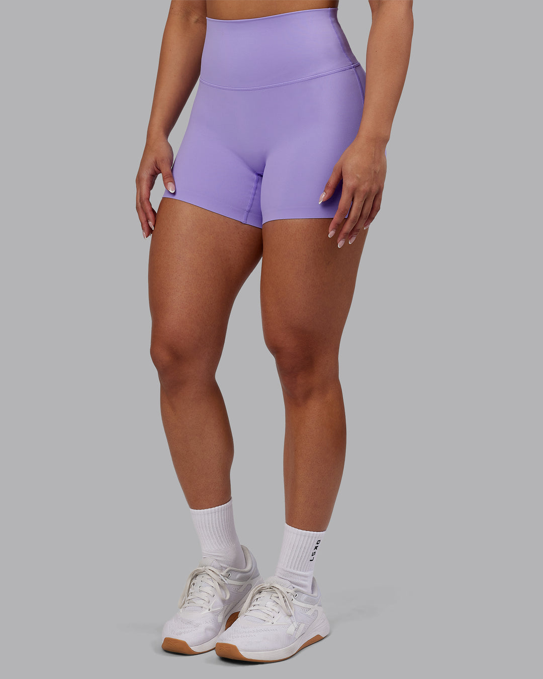 Woman wearing Elixir Ultra High-Rise 4" Short - Violet Ray | Model:Ayla | Size:S - view 5