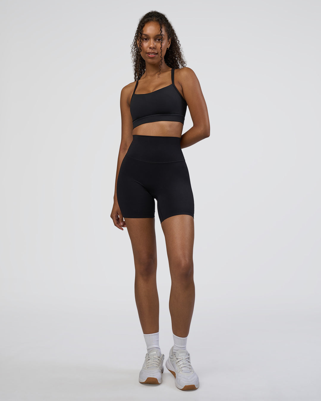 Woman wearing Elixir Ultra High-Rise 6" Short - Black | Model:Jordan | Size:S - view 5