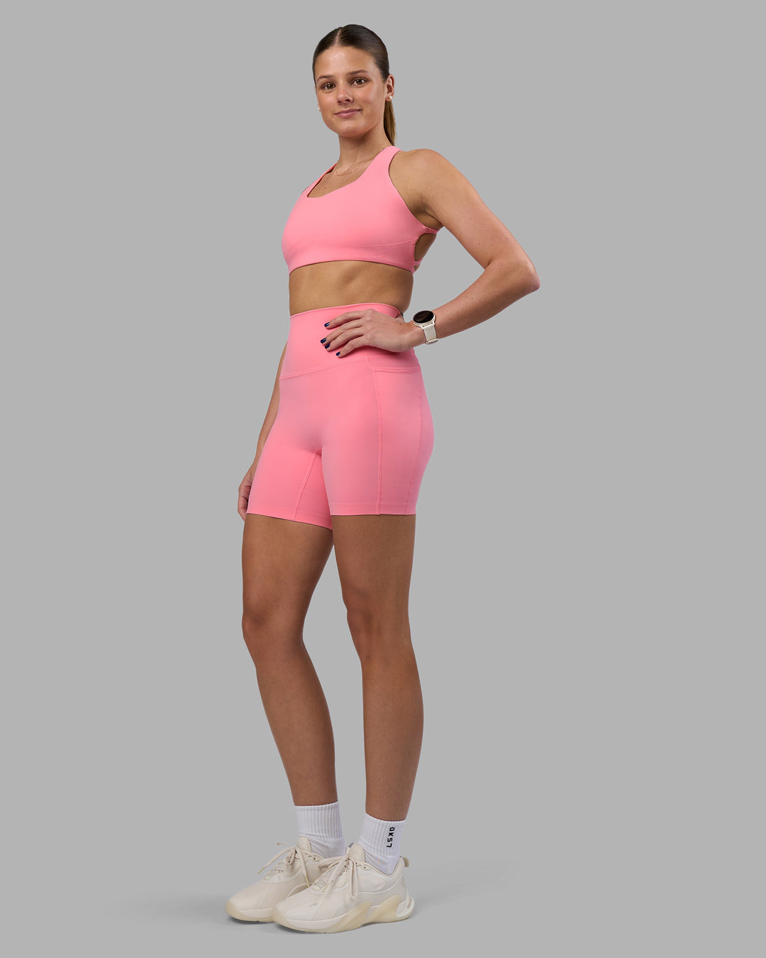 Woman wearing Elixir Ultra High-Rise 6" Short Pockets - Candy Pink | Model:Phoebe | Size:S - view 6