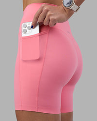 Woman wearing Elixir Ultra High-Rise 6" Short Pockets - Candy Pink | Model:Phoebe | Size:S | Thumbnail Index: 2