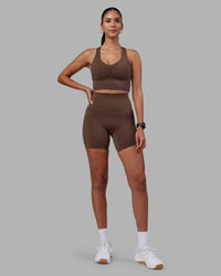 Woman wearing Elixir Ultra High-Rise 6" Short Pockets - Chocolate Martini | Model:Rhiley | Size:S | Thumbnail Index: 8