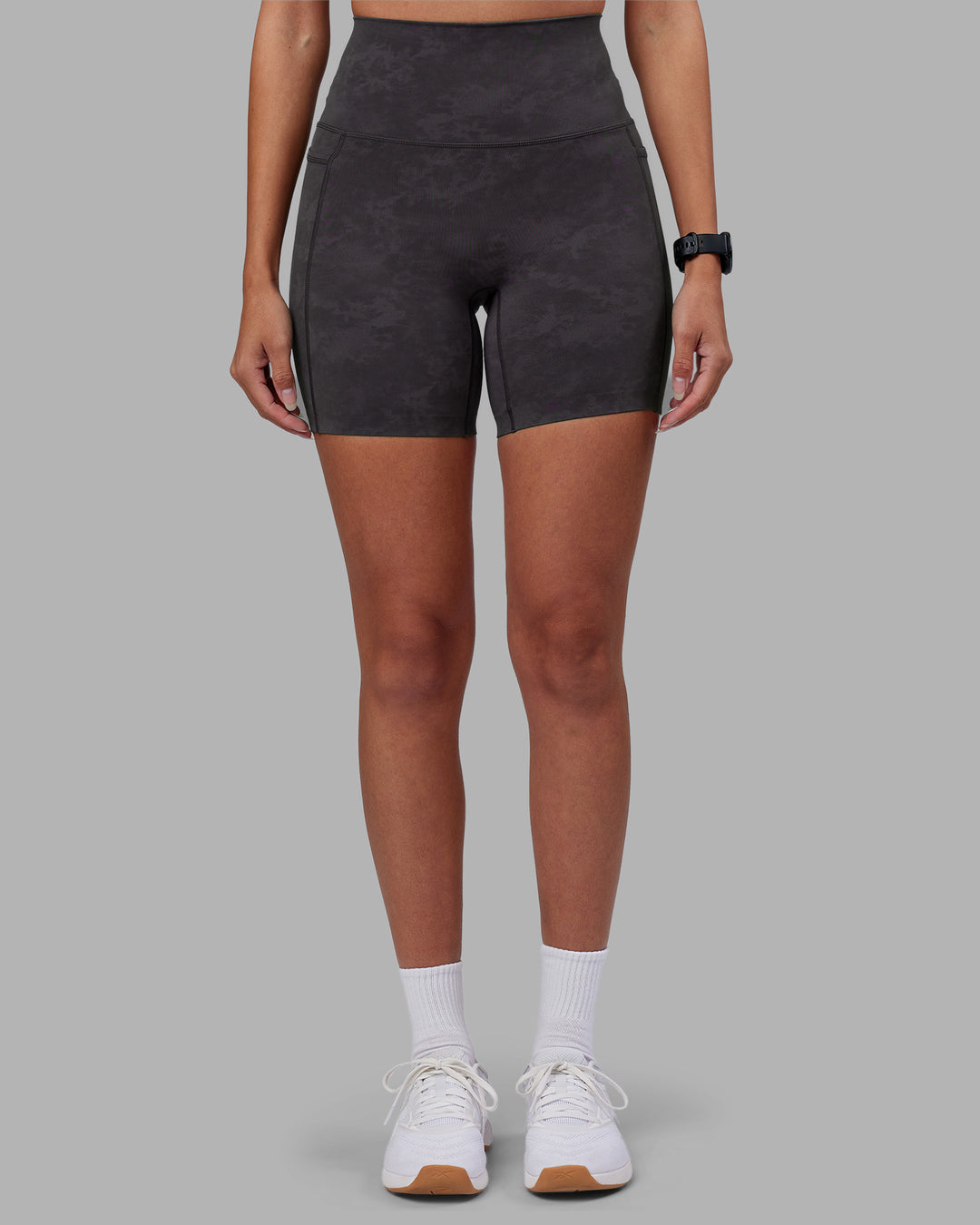 Woman wearing Elixir Ultra High-Rise 6" Short Pockets - Dark Storm Wash | Model:Rhiley | Size:S - view 3