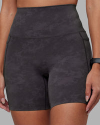Woman wearing Elixir Ultra High-Rise 6" Short Pockets - Dark Storm Wash | Model:Rhiley | Size:S | Thumbnail Index: 5