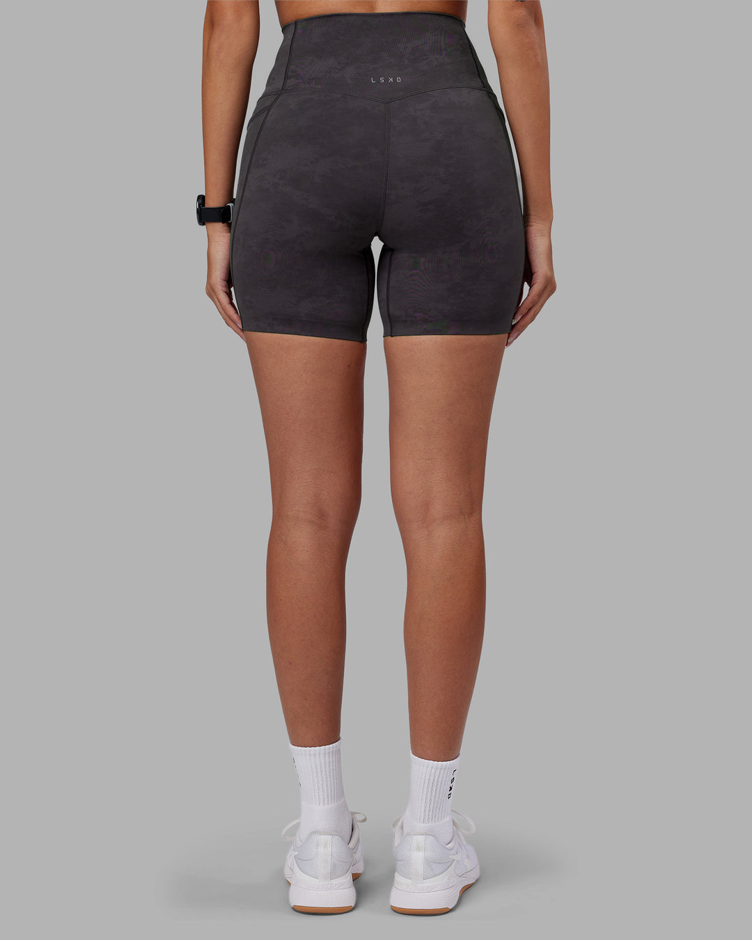 Woman wearing Elixir Ultra High-Rise 6" Short Pockets - Dark Storm Wash | Model:Rhiley | Size:S - view 4
