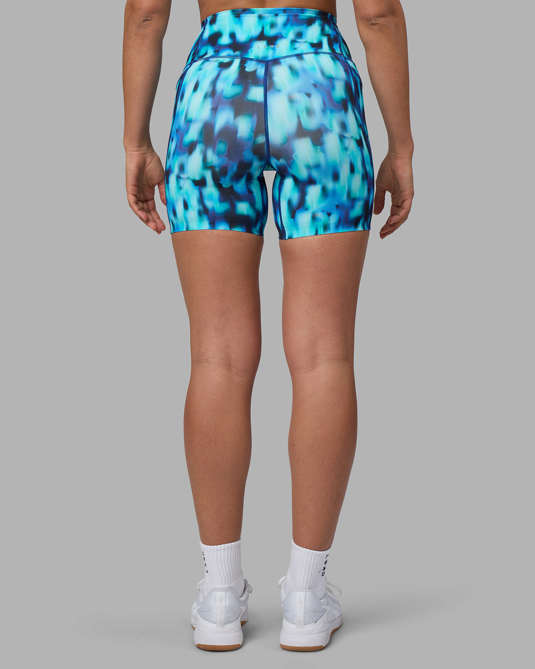 Woman wearing Elixir Ultra High-Rise 6" Short Pockets - Luminous | Model:Sophie | Size:S - view 3