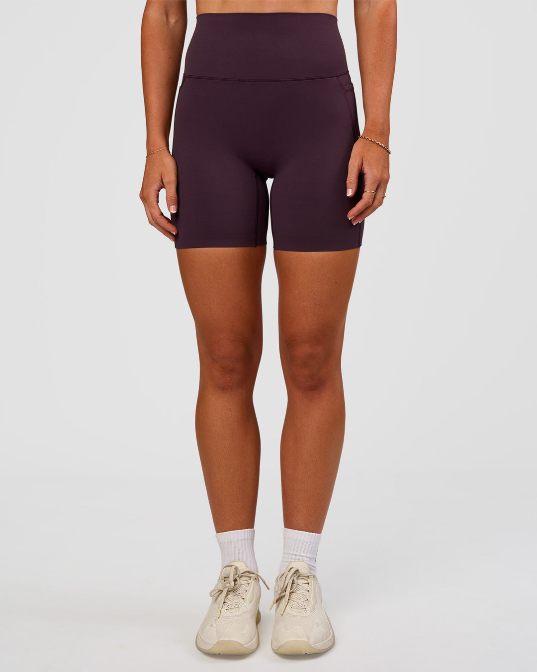 Woman wearing Elixir Ultra High-Rise 6” Short Pockets - Midnight Plum | Model:Emelia | Size:S - view 7