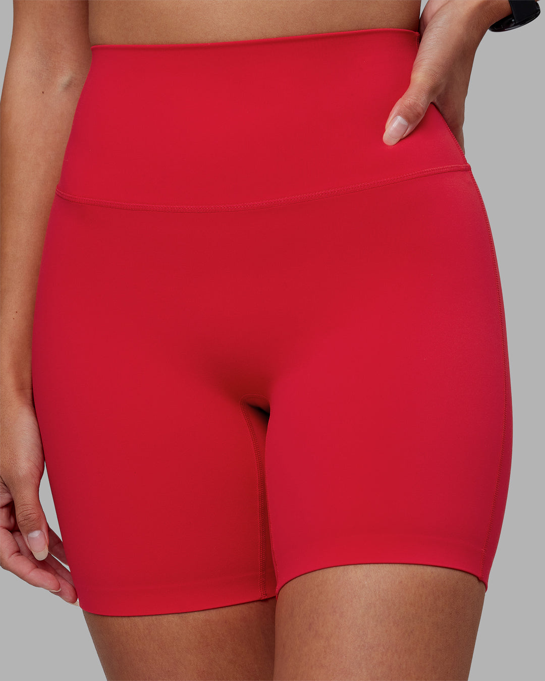 Woman wearing Elixir Ultra High-Rise 6" Short - Scarlet | Model:Rhiley | Size:S - view 3