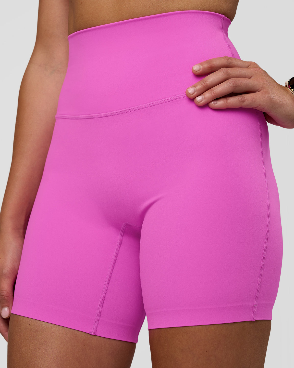 Woman wearing Elixir Ultra High-Rise 6" Short - Ultra Fuchsia | Model:Myrte | Size:S
