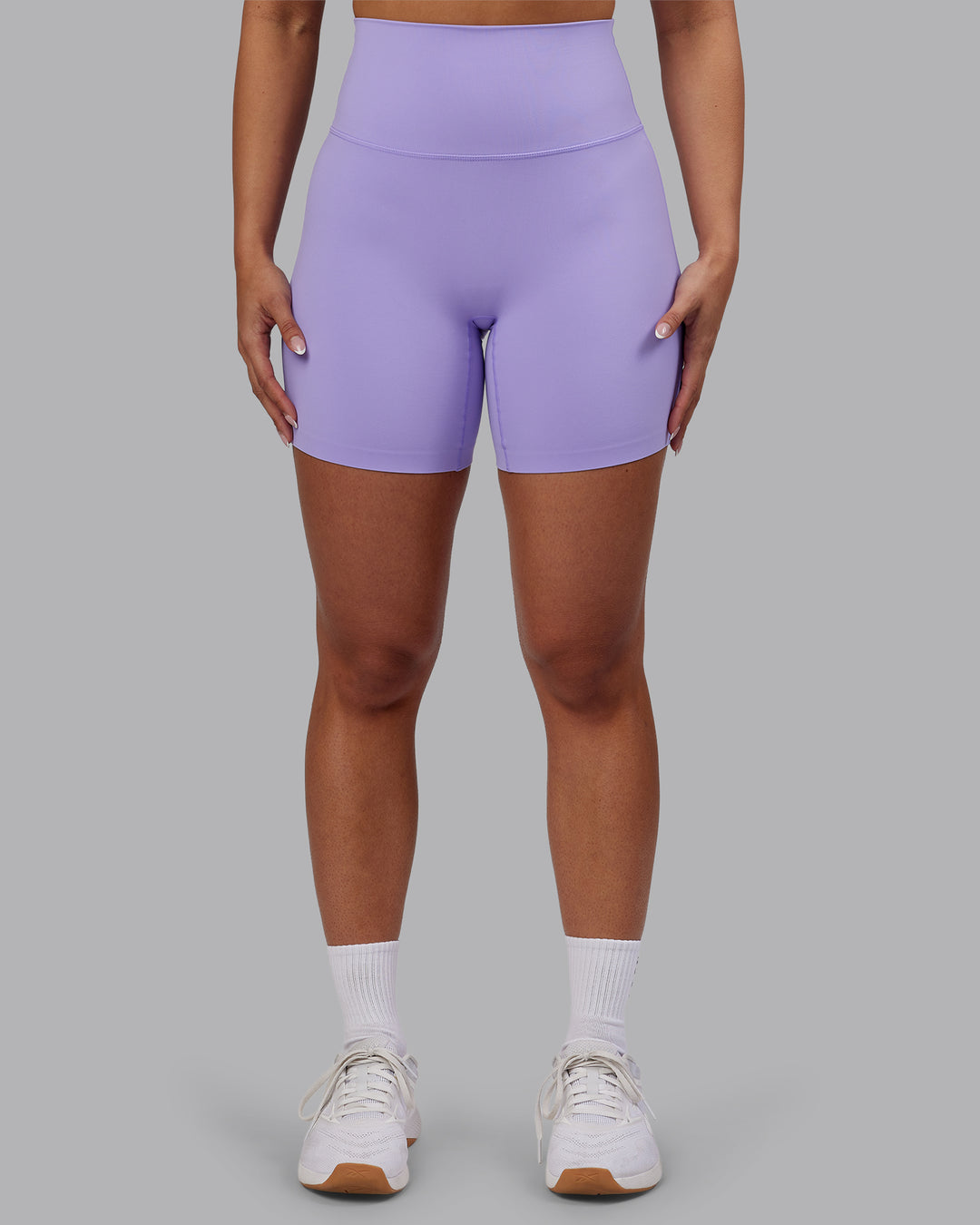 Woman wearing Elixir Ultra High-Rise 6" Short - Violet Ray | Model:Ayla | Size:S - view 1