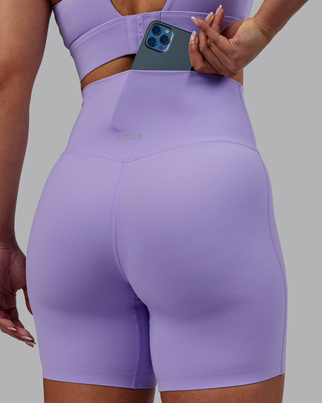 Woman wearing Elixir Ultra High-Rise 6" Short - Violet Ray | Model:Ayla | Size:S - view 3