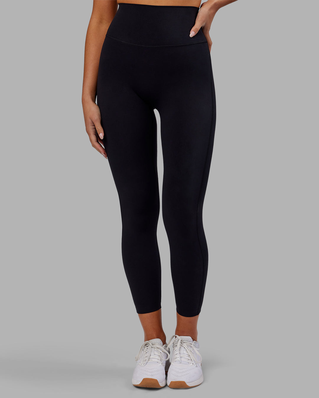 Woman wearing Elixir Ultra High-Rise 7/8 Legging - Black | Model:Kirstyn | Size:S - view 2