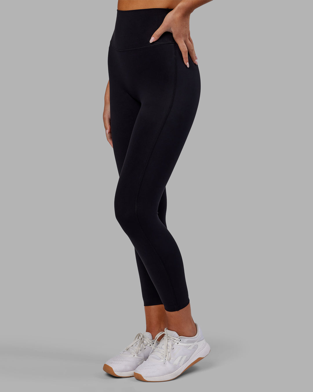 Woman wearing Elixir Ultra High-Rise 7/8 Legging - Black | Model:Kirstyn | Size:S - view 6