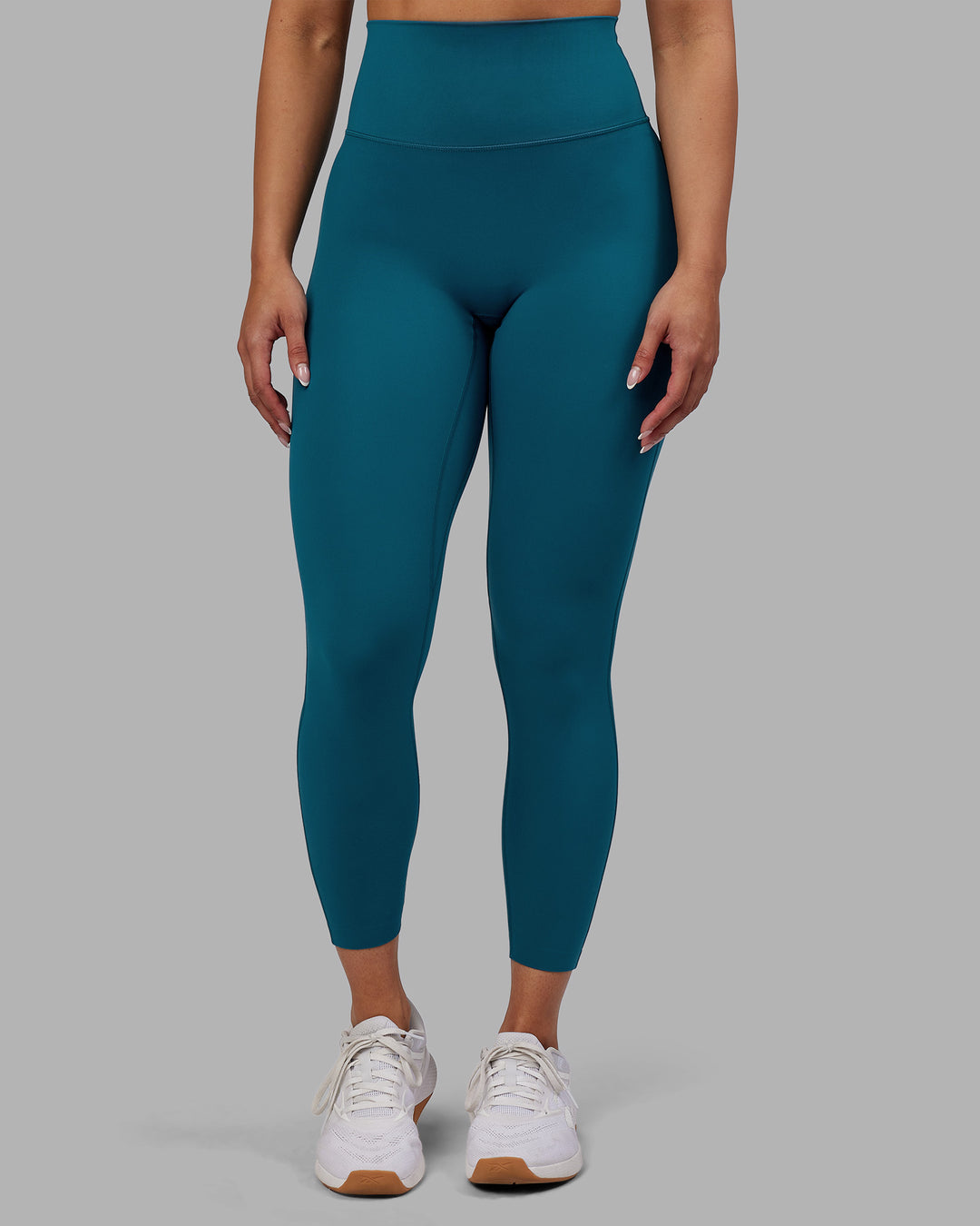 Woman wearing Elixir Ultra High-Rise 7/8 Legging - Blue Coral | Model:Ayla | Size:S - view 7