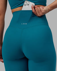 Woman wearing Elixir Ultra High-Rise 7/8 Legging - Blue Coral | Model:Ayla | Size:S | Thumbnail Index: 5