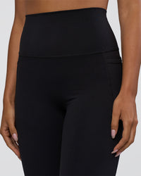 Woman wearing Elixir Ultra High-Rise 7/8 Legging Pockets - Black | Model:Ruby | Size:S | Thumbnail Index: 6