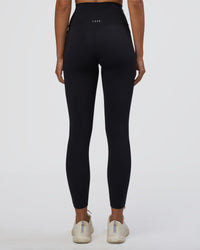 Woman wearing Elixir Ultra High-Rise 7/8 Legging Pockets - Black | Model:Ruby | Size:S | Thumbnail Index: 3