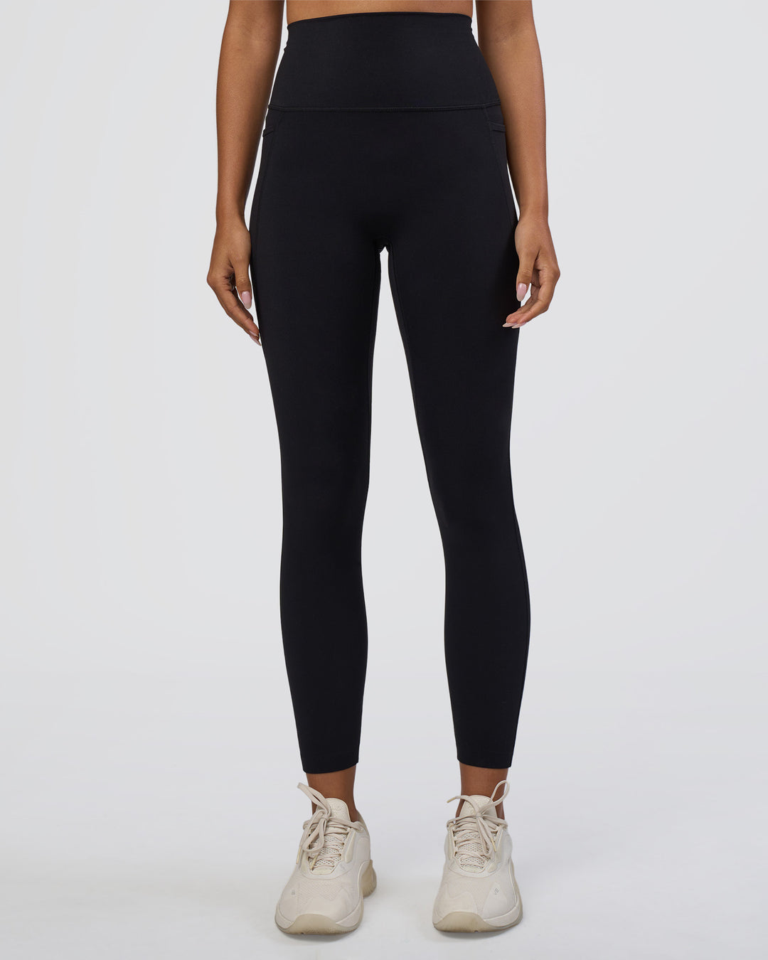 Woman wearing Elixir Ultra High-Rise 7/8 Legging Pockets - Black | Model:Ruby | Size:S - view 6